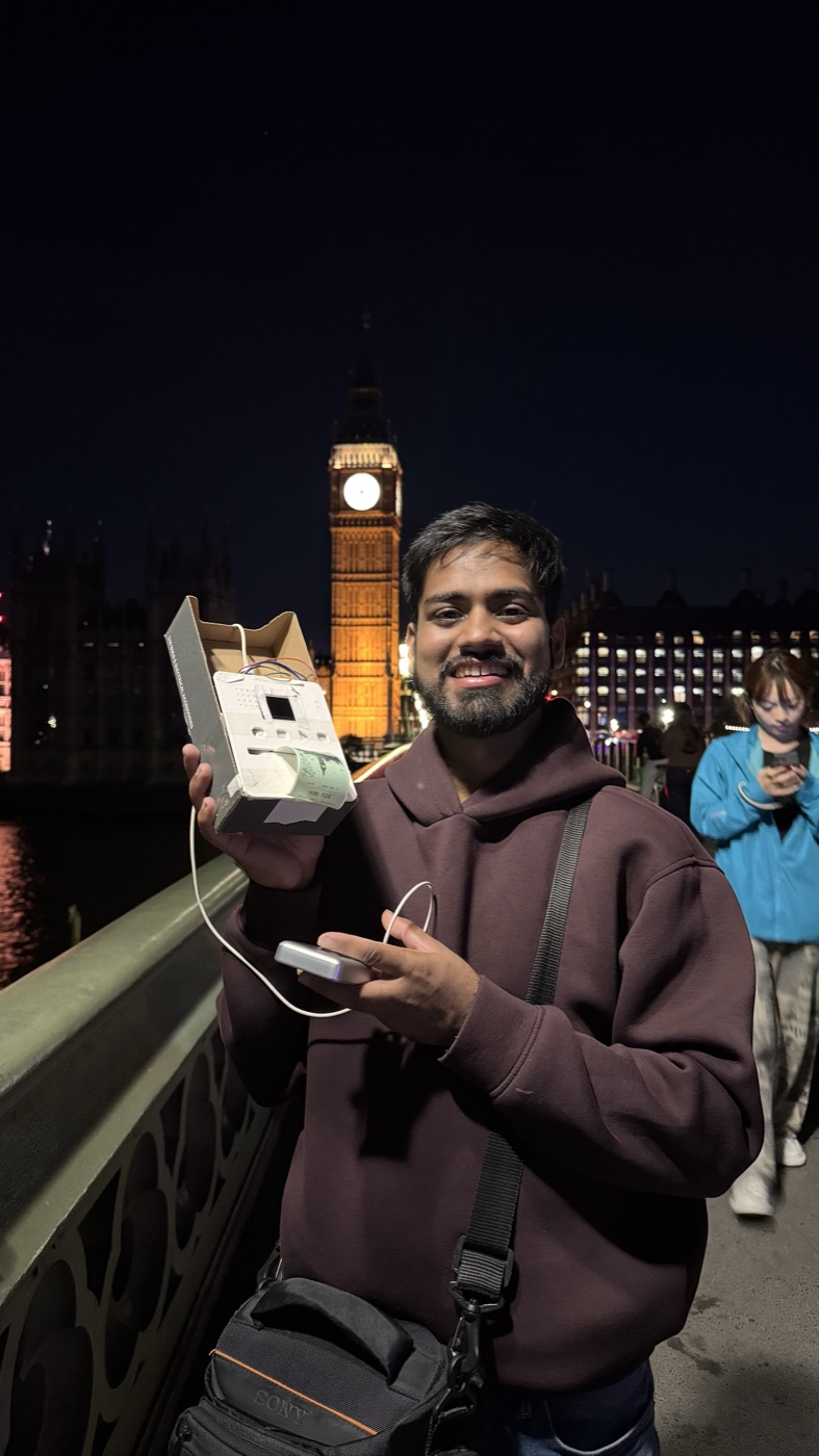 Holding the working prototype on Westminster Bridge.